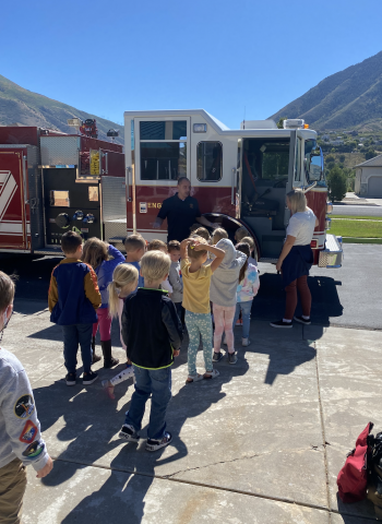 lining up to see fire truck