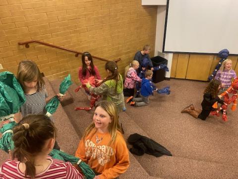 third graders making puppets