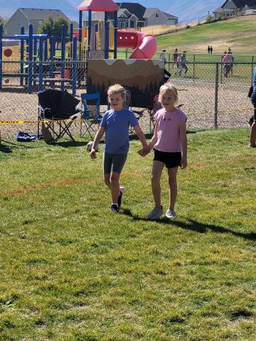 kids holding hand running